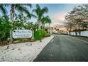 Entrance to Bay Crest Park featuring Community Boat Ramp with lush greenery and a serene atmosphere at 4807 Wynwood Dr, Tampa, FL 33615