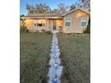 Charming single-story home with a walkway and welcoming entrance at 2301 46Th S St, St Petersburg, FL 33711