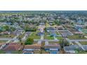 Panoramic aerial view of the residential neighborhood with tree-lined streets and well-kept homes at 4306 Goldcoast Ave, Spring Hill, FL 34609