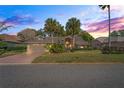 Beautiful home highlighted by tropical landscaping, and stunning sunset views at 9405 Ashley Dr, Weeki Wachee, FL 34613