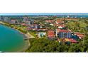 Aerial view of Isla del Sol condos, waterways, golf course, and Tampa Bay area at 6365 Bahia Del Mar Blvd # 112, St Petersburg, FL 33715