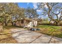 Awaiting transformation, this house shows potential within its spacious lot at 9435 Ottawa St, New Port Richey, FL 34654