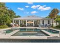 Stunning backyard pool and spa area, perfect for relaxation and entertaining guests at 140 Miramar Ne Blvd, St Petersburg, FL 33704