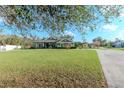 Well-maintained green home on a spacious lot with a long driveway at 3206 Duchess Ct, Plant City, FL 33565