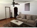 Living room with hardwood floors, sofa, and coffee table at 2734 53Rd N Ave, St Petersburg, FL 33714