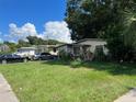 Three houses on a residential street at 5634 5Th N Ave, St Petersburg, FL 33710