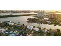 Stunning aerial view of waterfront property, showcasing surrounding canals and city skyline at 42 Midway Is, Clearwater, FL 33767