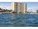 Exterior view of a high-rise building near the water at 4900 Brittany S Dr # 1303, St Petersburg, FL 33715