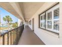 Condo balcony overlooking a lush green landscape at 8210 Aquila St # 223, Port Richey, FL 34668
