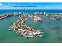 Aerial view of coastal property with Gulf of Mexico and Clearwater Beach views at 295 Bayside Dr, Clearwater Beach, FL 33767