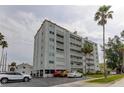 Desirable condo building offers balconies and convenient parking spaces at 403 Gulf Way # 504, St Pete Beach, FL 33706