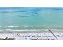 Aerial view of beach with pier and ocean at 18400 E Gulf Blvd # Ph-11, Indian Shores, FL 33785