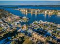 Aerial view of waterfront property, showcasing the building and surrounding area at 605 Poinsettia Ave # 5, Clearwater, FL 33767