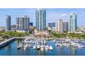 Aerial view showing a marina and high rise buildings at 100 1St N Ave # 2205, St Petersburg, FL 33701