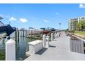 Community boat dock with multiple boat slips at 660 Island Way # 401, Clearwater, FL 33767