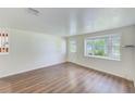 Spacious living room with bay window and hardwood floors at 10162 115Th Ave, Largo, FL 33773