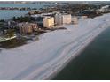 Aerial view of beachfront property and surrounding area at 5000 Gulf Blvd # 704, St Pete Beach, FL 33706