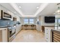 Modern kitchen with ocean view, stainless steel appliances at 5000 Gulf Blvd # 704, St Pete Beach, FL 33706