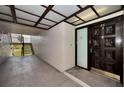 Interior hallway with access to unit and staircase to outside at 3021 Countryside Blvd # 28A, Clearwater, FL 33761