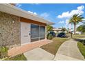 Front entrance of updated one-story home at 4321 Tahitian Gardens Cir # A, Holiday, FL 34691