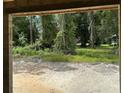 View of backyard from inside the house under construction at 4056 Southern Valley Loop, Brooksville, FL 34601