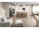 Modern kitchen with stainless steel appliances and an island at 10005 Zennia Ln, Parrish, FL 34219