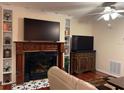 Living room features a fireplace and built-in shelving at 21146 Fountain View Ln # 4102, Lutz, FL 33558