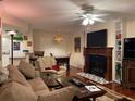 Spacious living room with fireplace and hardwood floors at 21146 Fountain View Ln # 4102, Lutz, FL 33558