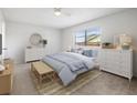 Cozy bedroom featuring a comfortable bed and ample storage at 2027 Beckwith Ave, Spring Hill, FL 34608