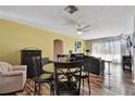 Inviting living room features sleek floors, soft lighting, and comfortable seating arrangement at 8438 Luray Dr, Port Richey, FL 34668