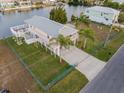 Elevated home with private dock and large backyard at 3340 Oleander Dr, Hernando Beach, FL 34607