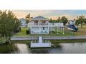 Elevated home on the waterfront with private dock at 3340 Oleander Dr, Hernando Beach, FL 34607