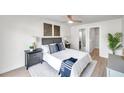 Spacious bedroom with a comfortable bed, nightstands and en-suite bathroom at 101 Hillcrest Dr, Safety Harbor, FL 34695