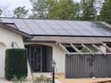 Close up of house exterior showing solar panels at 2019 Monica Ave, Spring Hill, FL 34609