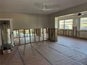 Renovation in progress, living room with exposed walls and flooring at 5142 Topaz Ln # 103, New Port Richey, FL 34652