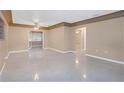 Spacious living room with tile flooring and neutral walls at 5931 Pine St, New Port Richey, FL 34652