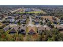 Aerial view of a house and neighborhood, showcasing the surrounding area at 13793 Dunwoody Dr, Spring Hill, FL 34609
