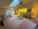 Open living room with kitchen and dining room views at 4351 Castle Ave, Spring Hill, FL 34609