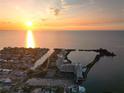 Stunning sunset view of waterfront property and community at 5915 Sea Ranch Dr # 704, Hudson, FL 34667