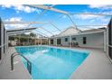 Relaxing screened-in pool, great for Gathering fun at 2643 Narcissus Dr, Holiday, FL 34691