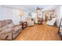 Living room with hardwood floors and seating at 4426 Pelorus Dr # 4426, New Port Richey, FL 34652