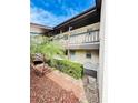 Condo building showcasing individual unit entrances and balconies at 4515 Marine Pkwy # 102, New Port Richey, FL 34652