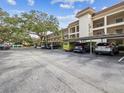 Community parking with covered carports offers ample parking space for residents and their visitors at 840 Virginia St # 202, Dunedin, FL 34698