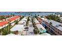 Aerial view of waterfront property showing home and surrounding buildings at 1603 N Gulf N Dr # 30, Bradenton Beach, FL 34217