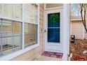 Front entrance with a welcoming wreath at 2422 Hounds Trl, Palm Harbor, FL 34683