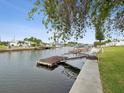 Private dock and backyard overlooking a peaceful canal at 4430 Floramar Ter, New Port Richey, FL 34652