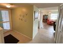 Bright entryway with view into living room at 5434 Chad Pl # 20, New Port Richey, FL 34652