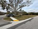 House exterior view from the street, showing a truck parked nearby at 3039 Sandpiper Ct, Clearwater, FL 33762