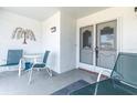 Bright and airy screened porch with table and chairs at 11030 Linkside Dr # 11030, Port Richey, FL 34668