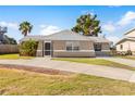Well-maintained house with a long driveway at 13637 Lagoon Dr, Hudson, FL 34667